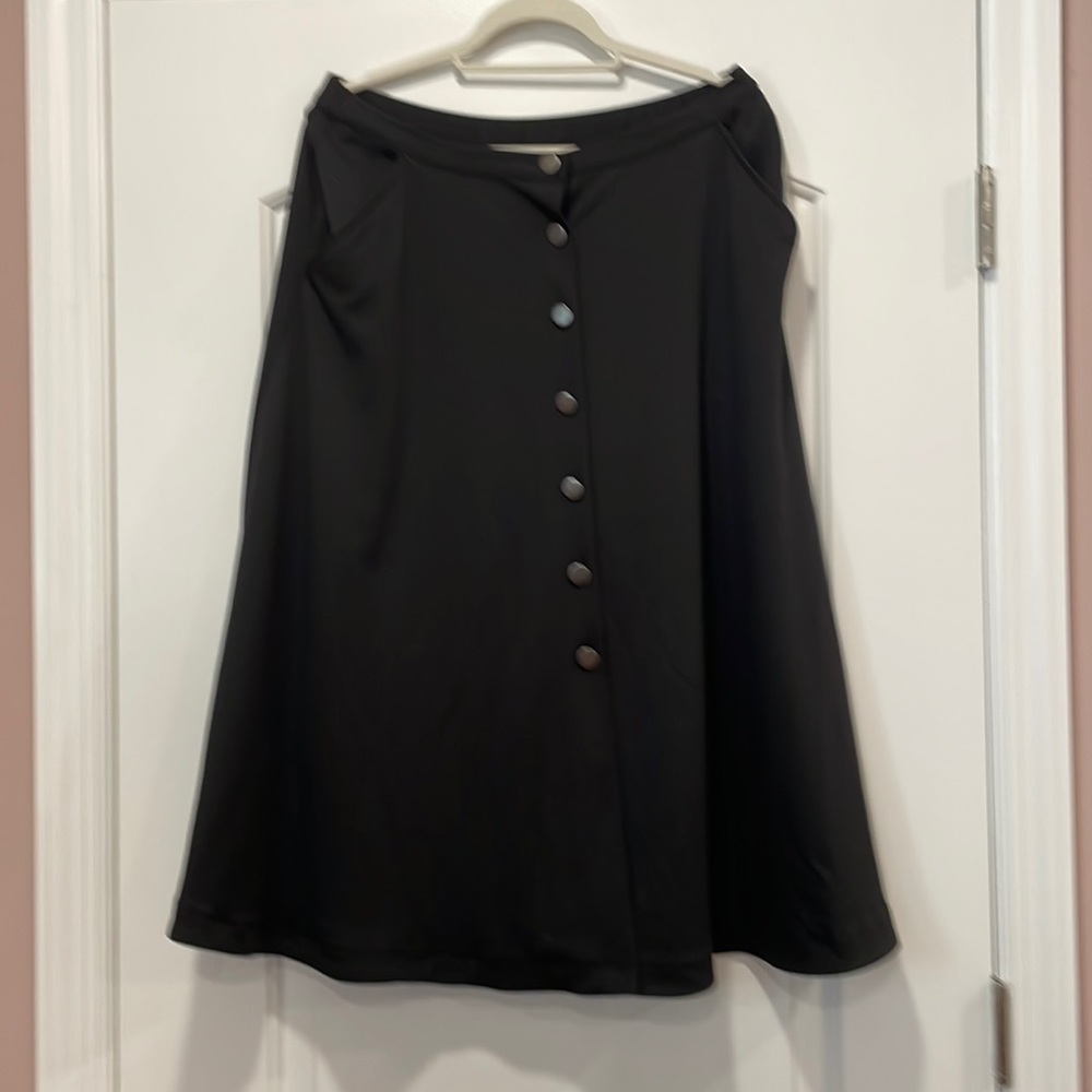 Black A-line skirt buttons down the front all buttons can be opened never worn